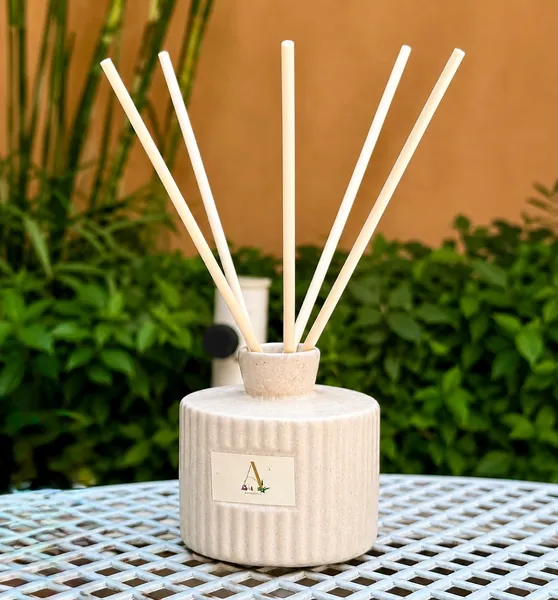 Aromatica Pottery Reed Diffuser on a terrace table